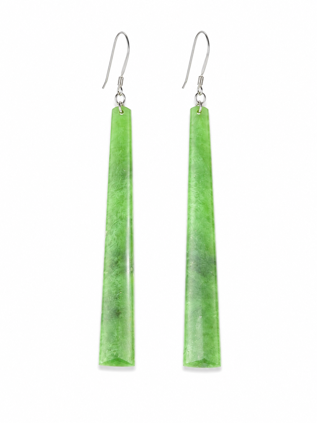A pair of long, tapered green stone dangle earrings with silver fishhook wires, shown against a plain white background.