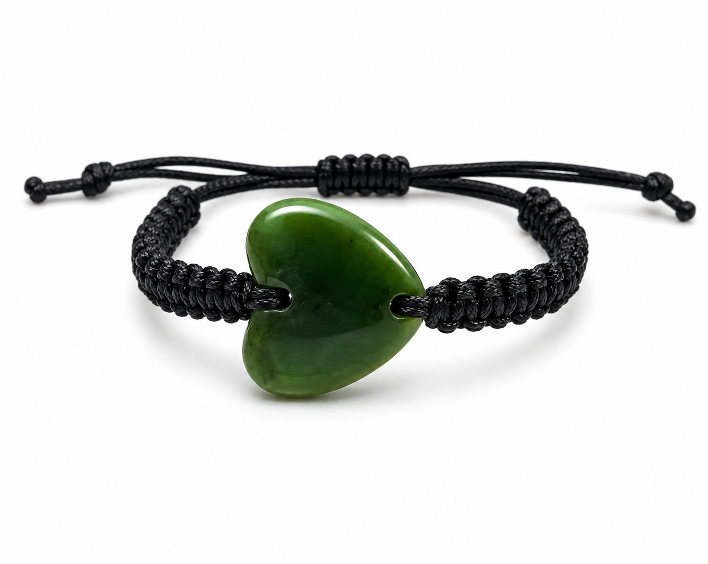 A black adjustable cord bracelet featuring a smooth, polished green heart-shaped stone pendant, displayed on a clean white background.