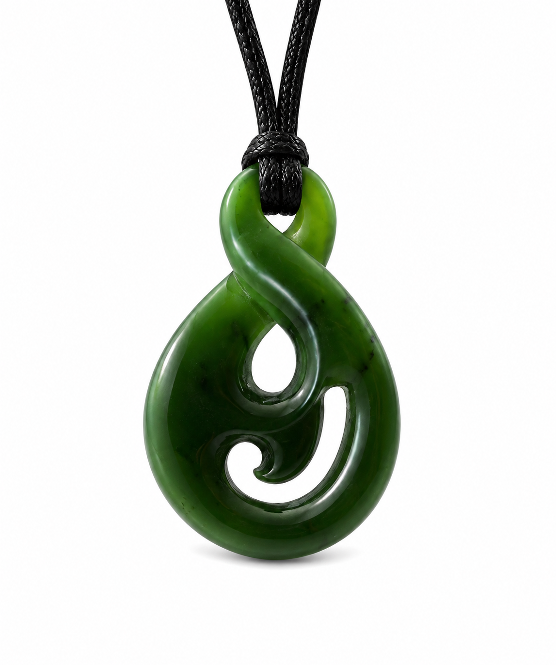 A carved green jade pendant with a South Pacific wavy motif, suspended from a black braided cord necklace against a plain white background.