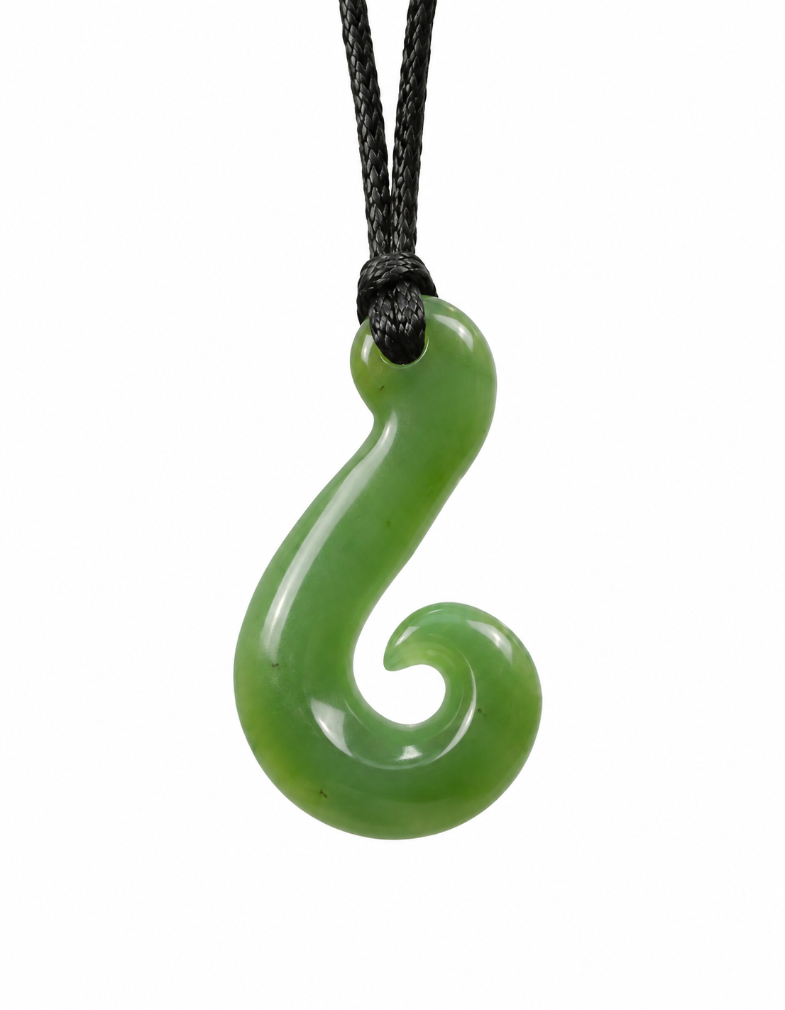 A green carved stone or jade pendant shaped like a hook, suspended from a black braided cord, shown against a plain white background.
