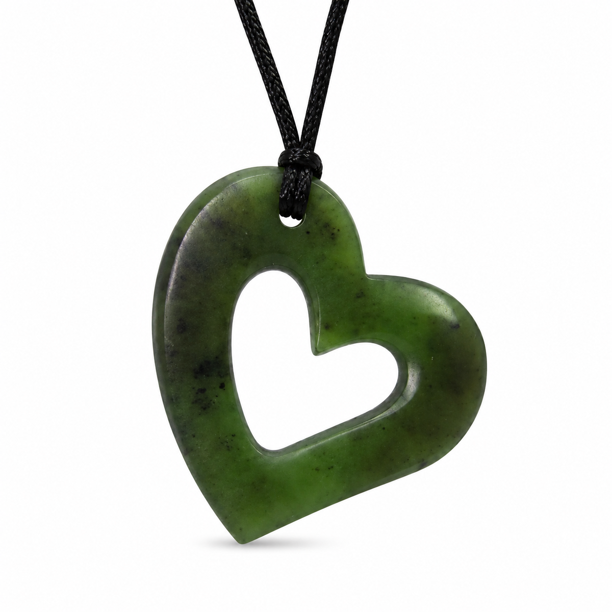A green heart-shaped pendant necklace made of polished stone with a cutout center, hanging from a black cord on a white background.