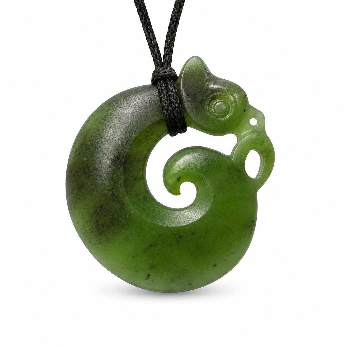 A green carved stone pendant shaped like a stylized curled animal head, suspended from a black cord on a white background.