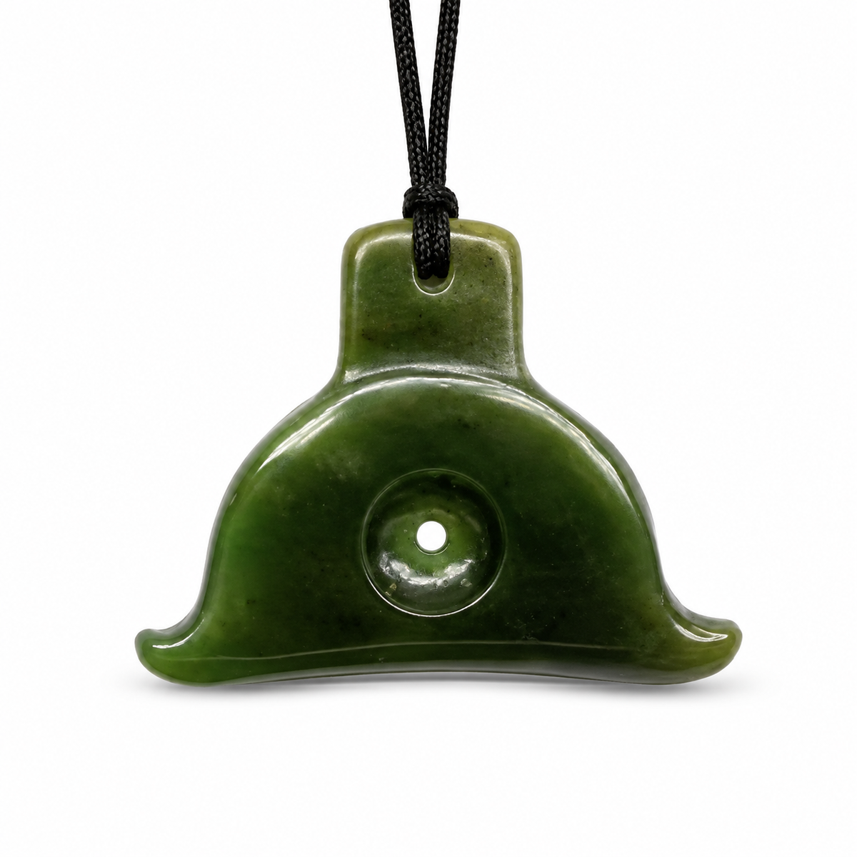 A green polished stone pendant with a central hole and a loop at the top, suspended from a black cord, shown against a plain white background.